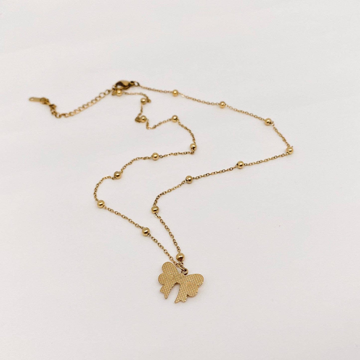 Gold Plated Stainless Steel Bow Pendant Necklace
